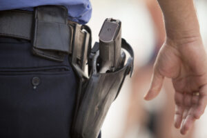 Armed Guard Near Gun